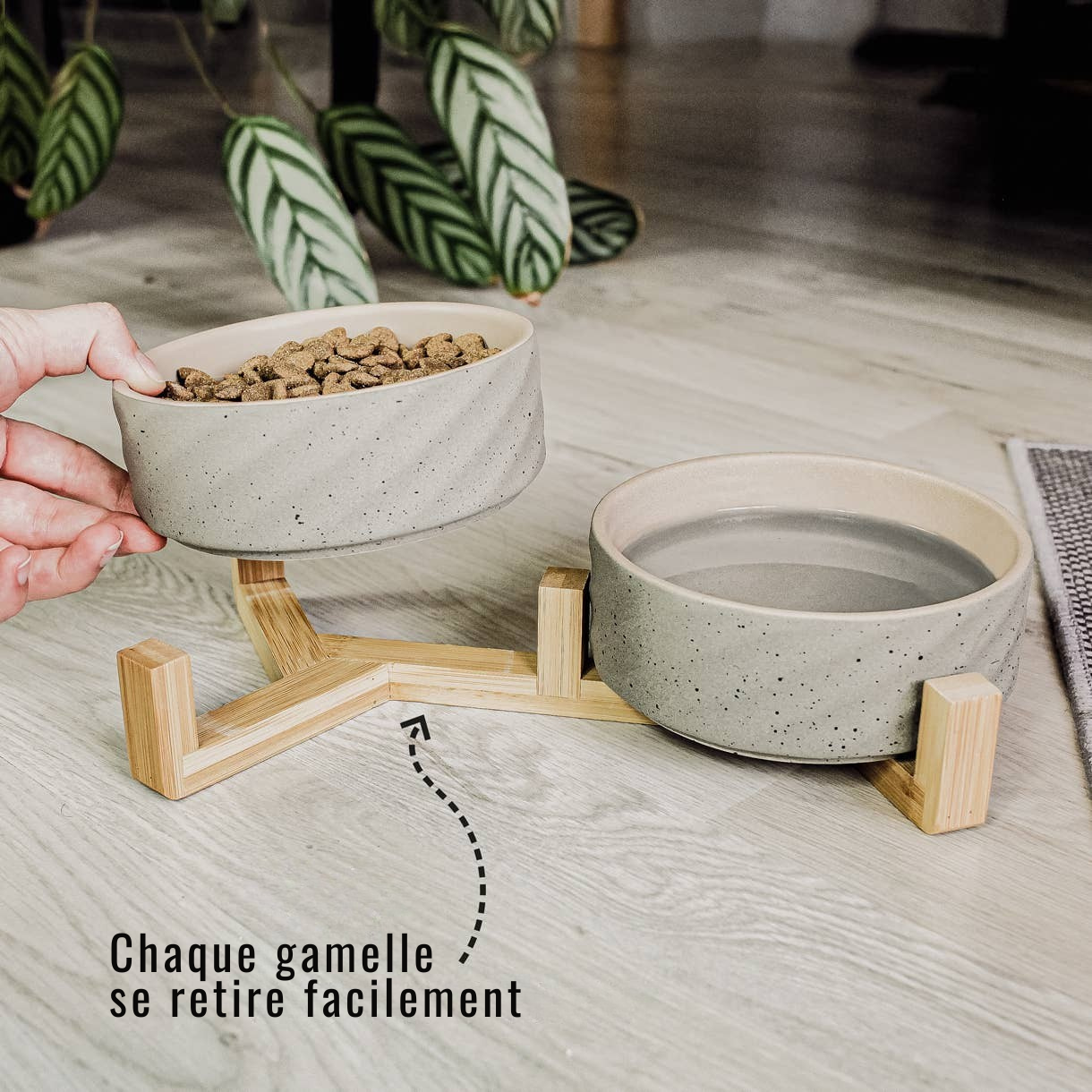 Double ceramic bowl on a bamboo stand