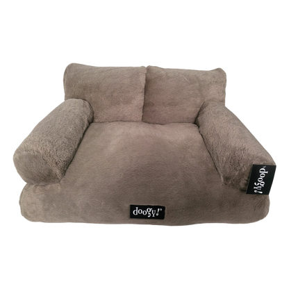 Soft armchair with backrest and armrests